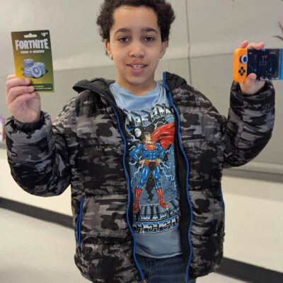 DeMonte with Mobile Shadow Store rewards_Reading Mentors_2025 a student with shadow store incentives