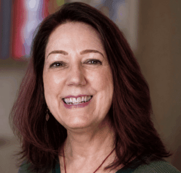 a brunette woman smiling