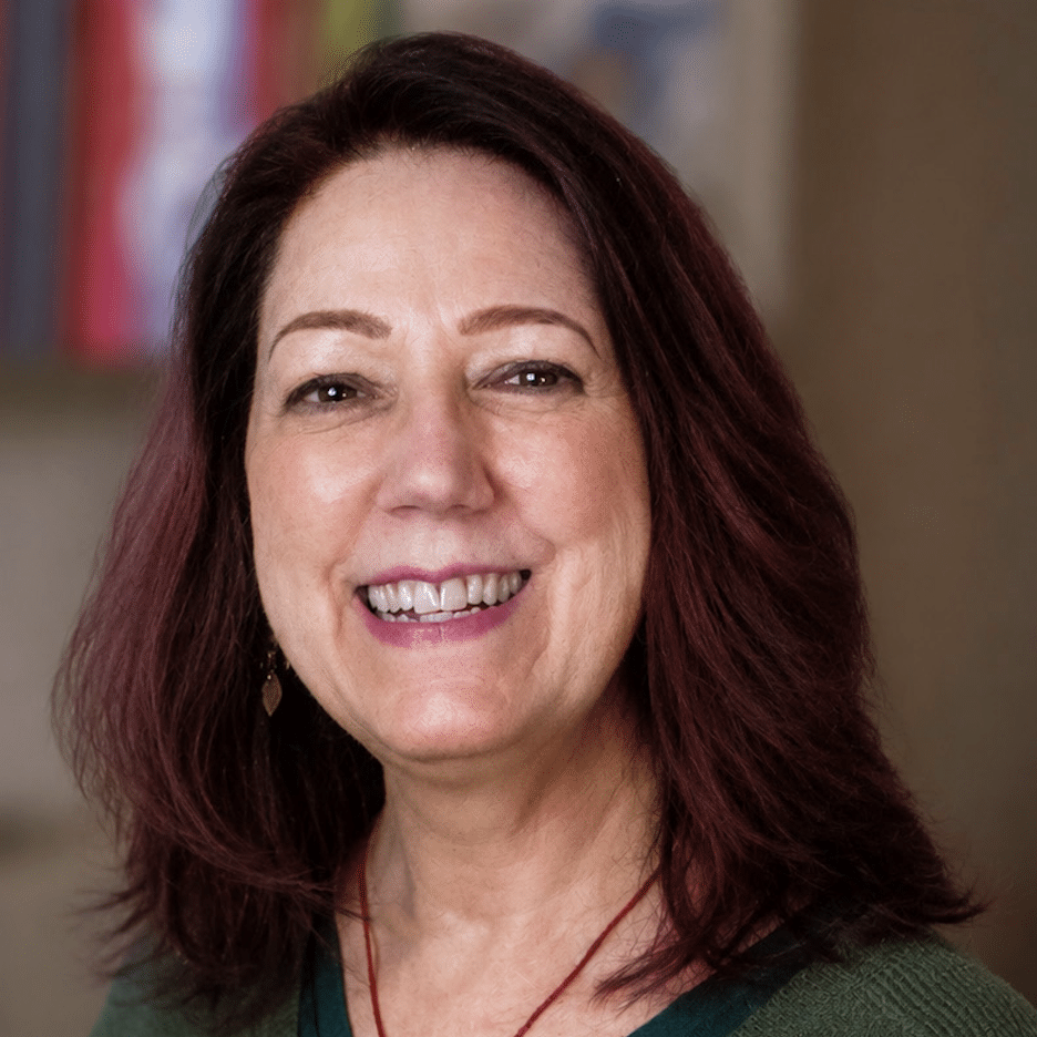a brunette woman smiling